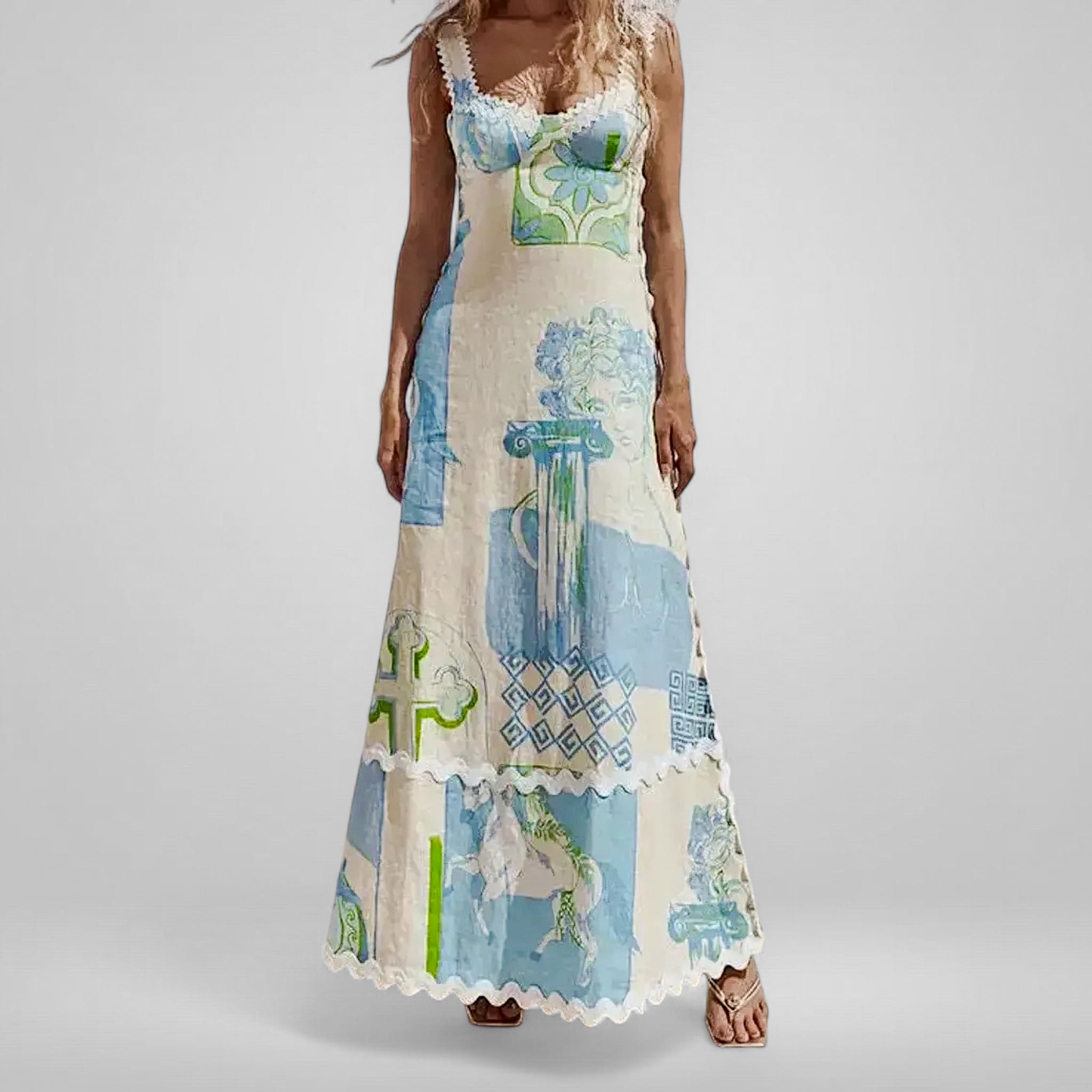 Woman wearing a long, patterned dress with a neutral background