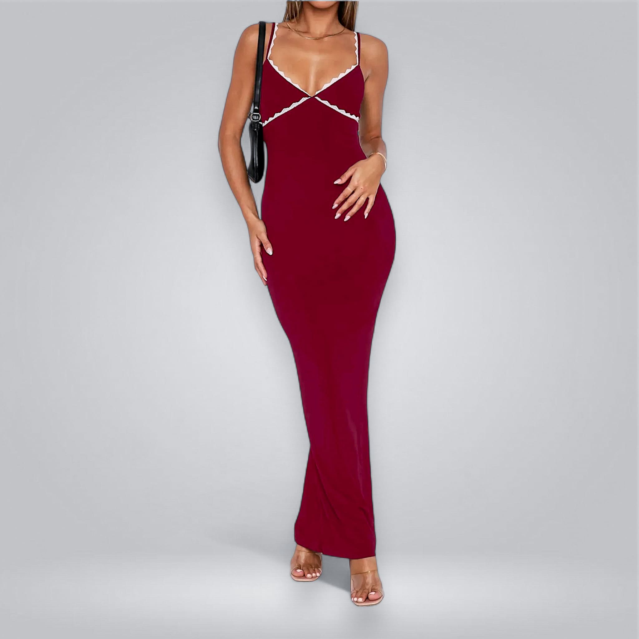 Red dress with thin straps on a gray background